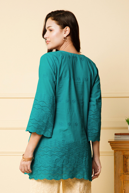 women blue green top